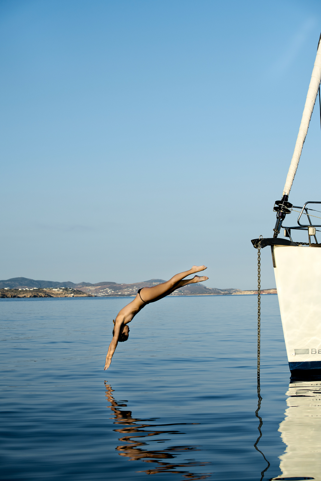 Barbarita Homs photographed aboard a sailing yacht in the Cyclades